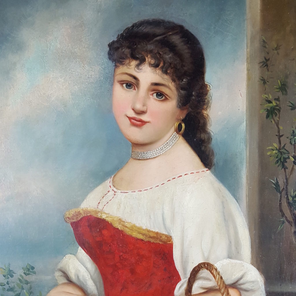 Young woman with basket of roses