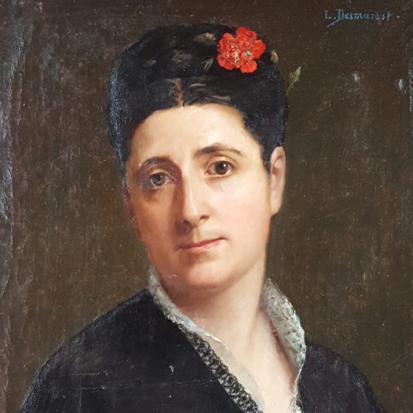 Portrait of a woman with carnation