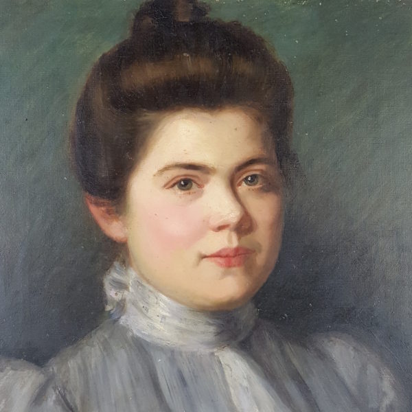 Portrait of a woman in a blue dress
