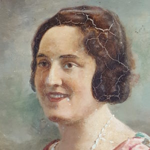 Portrait of a woman with a white necklace