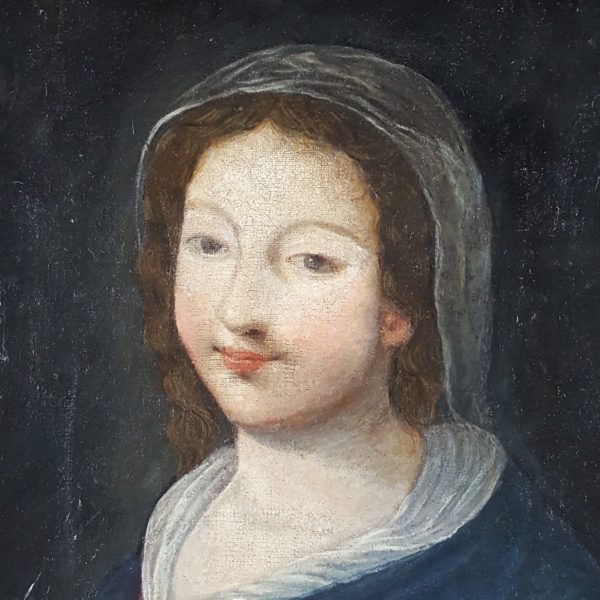 Portrait of a young woman with a veil