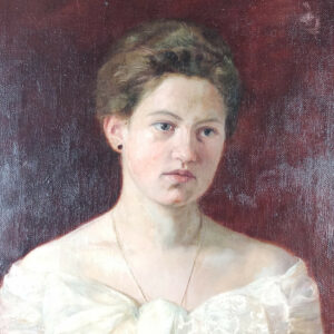 Portrait of young woman in white dress