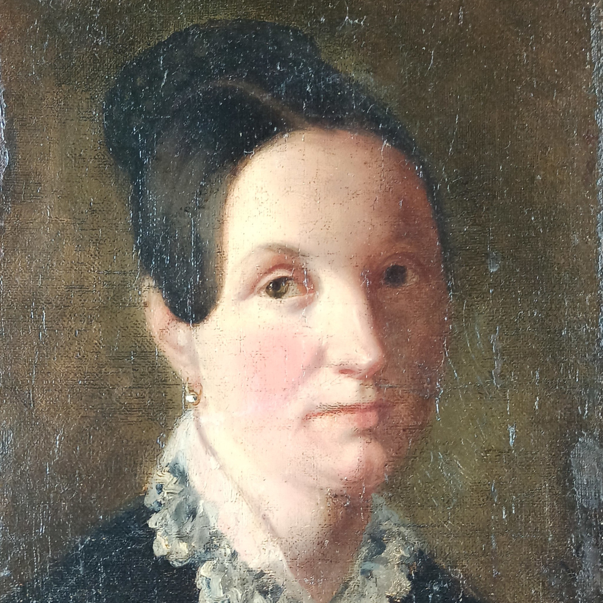 Portrait of a woman with a lace collar